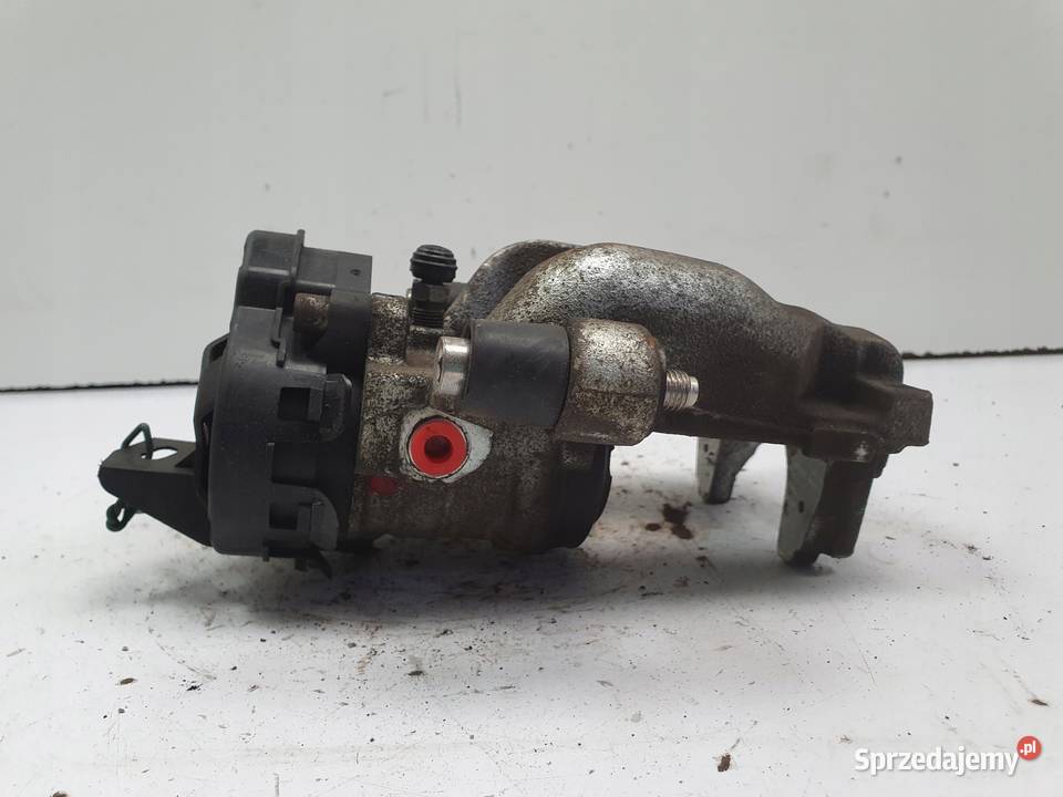 Volvo XC60 II TYLNY ZACISK HAMULCOWY LEWY tył Janów