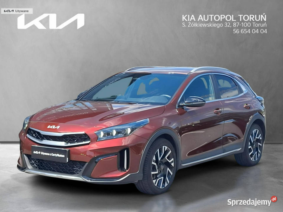 Kia XCeed FV2316 TGDI 7DCT Tribute Magma Red garażowany Toruń