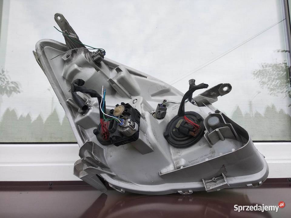 Toyota Corolla Verso I lampa przednia lewa Oświetlenie Sieradz