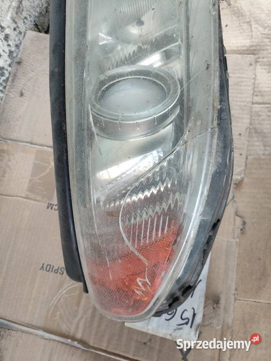 Reflektor uszkodzony volvo prawy przód V70 III Warszawa