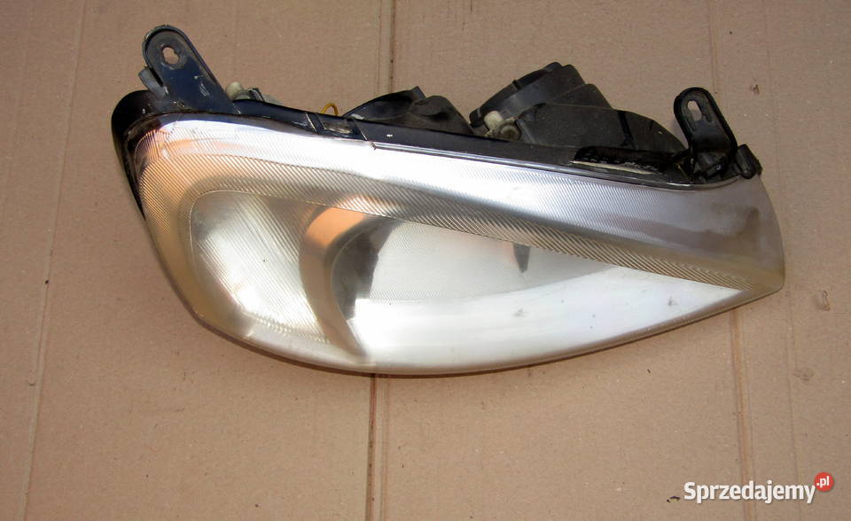 LAMPA PRZEDNIA PRAWA OPEL CORSA C206065 prawe łódzkie Mysłaków