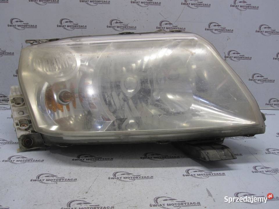 SUZUKI GRAND VITARA II 06r lampa prawa przód