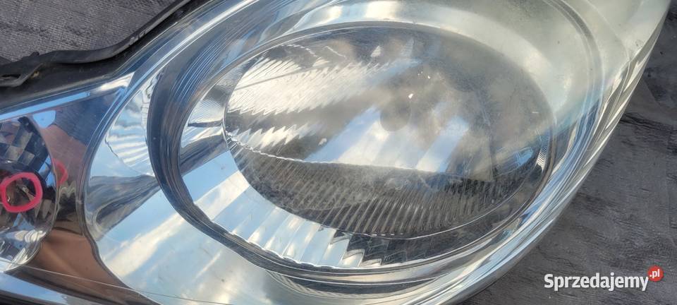 PEUGEOT 107 LEWY REFLEKTOR LAMPA LEWA PRZOD 1490 Ruda Śląska