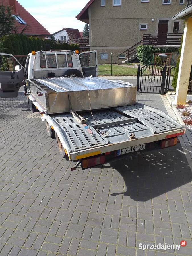 TRANSPORT PRZEPROWADZKI AUTO LAWETA
