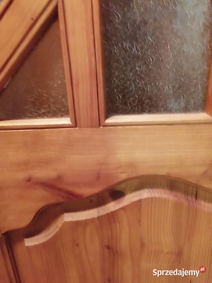 Drzwi z litego drewna z półłukiem robione na małopolskie