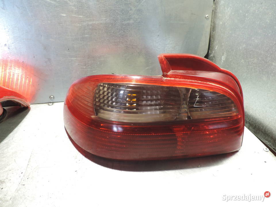 LAMPA LEWA LEWY TYŁ TOYOTA AVENSIS T22SEDAN