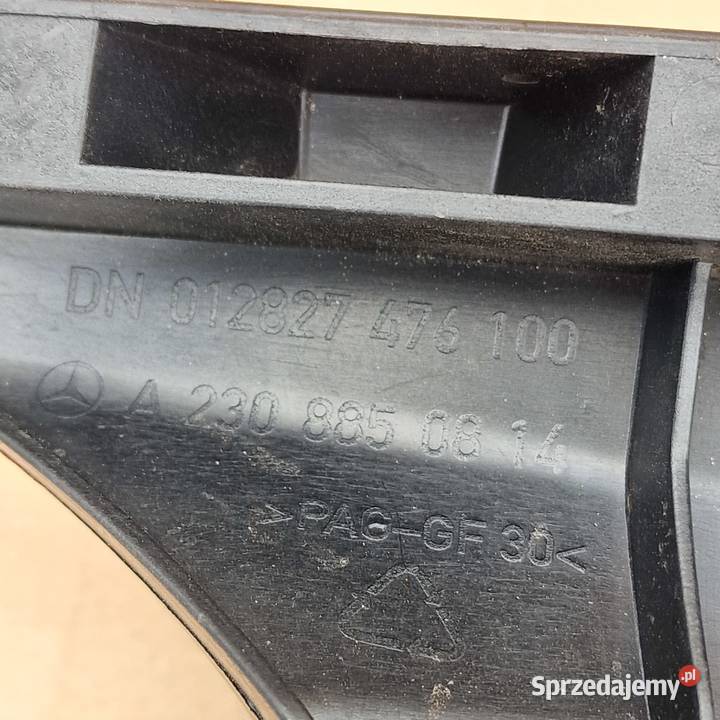 MERCEDES SL W230 ŚLIZG ZDERZAKA LEWY TYŁ NOWY osobowe Bieleń