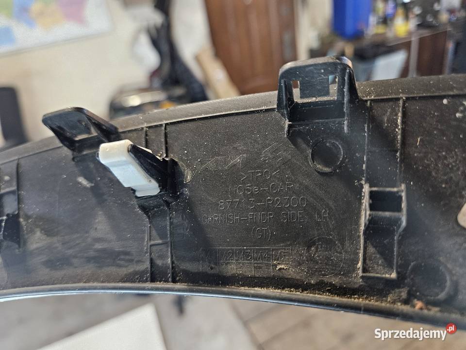 KIA SPORTAGE V 5 GT LINE LISTWA BŁOTNIKA LEWY osobowe Listwy i nakładki Międzychód