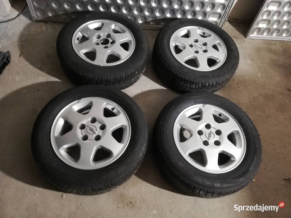 Felgi Opel 5x110 6Jx15H2 ET43 Opony 2 5 2 4 Zbaków Górny