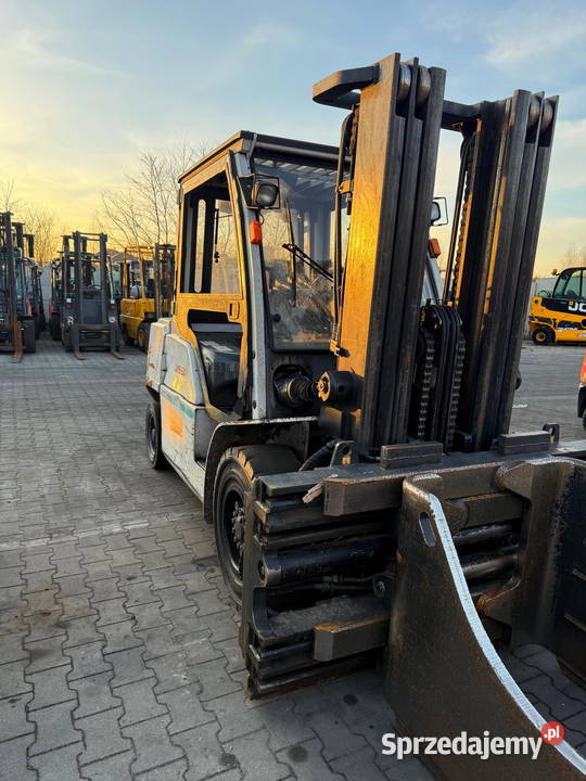pozycjoner wideł z chwytakiem udźwig 7000 klasa Wózki widłowe Motoryzacja łódzkie