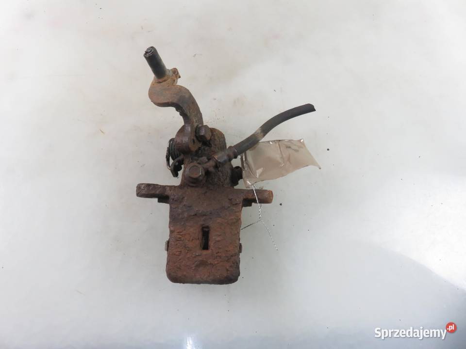 ZACISK LEWY TYŁ HYUNDAI COUPE II 20