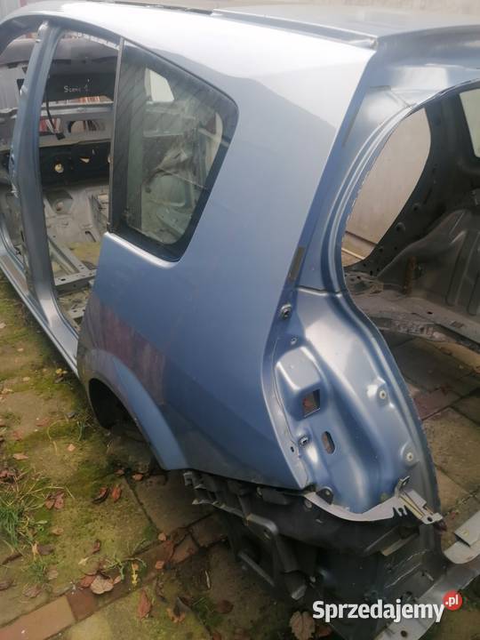 błotnik tył z szybą lewy prawy Renault Scenic