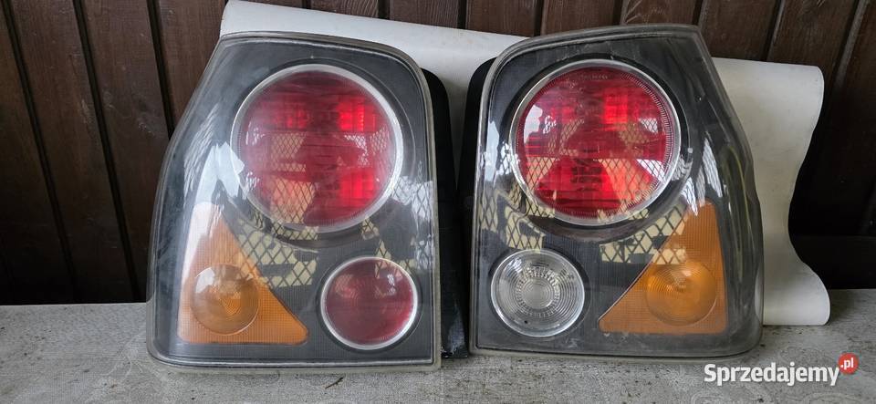 Lampy przód i tył arosa 2002r polift Kosin