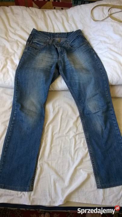 Męskie jeansy jasne z przetarciami Marki