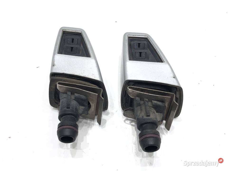 SPRYSKIWACZ REFLEKTORA PRAWY PRZÓD BMW E83 Van