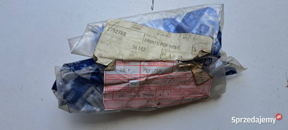 Zawias drzwi lewy dolny 7792768 FIAT Punto