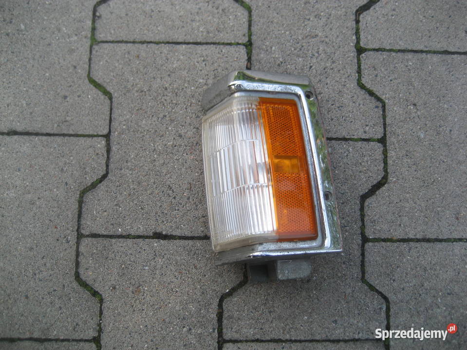 nissan terrano i 8795r kierunkowskaz lewy chrom Kierunkowskazy Rakoniewice sprzedam