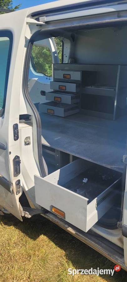 Renault Kangoo ZE 100elektryczny szafki regsły welurowa tapicerka Malinie