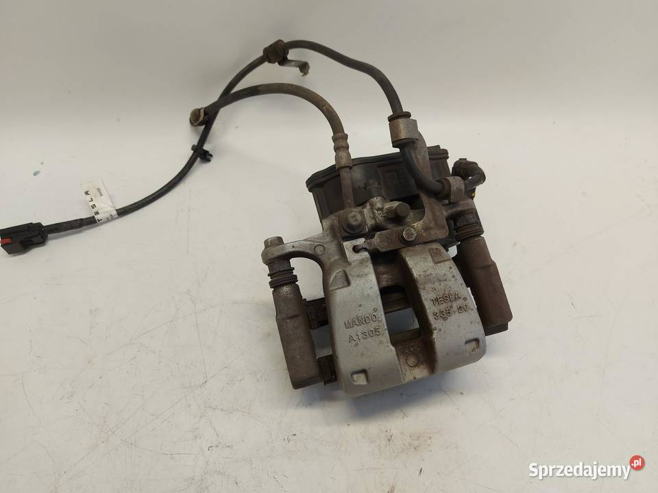 TESLA MODEL Y 2024r ZACISK HAMULCOWY PRAWY TYŁ