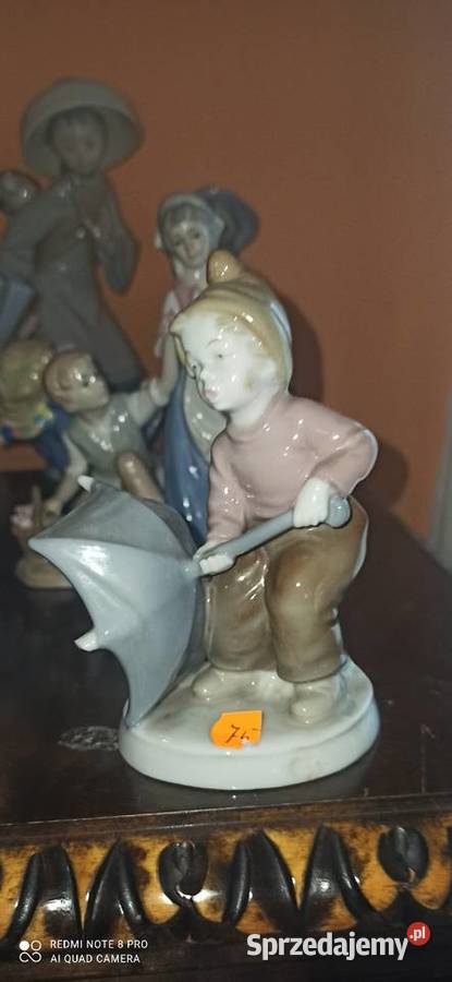 Figurka Dzieci na płocie z koszyczkiem SygTerra Porcelana i szkło Gdańsk