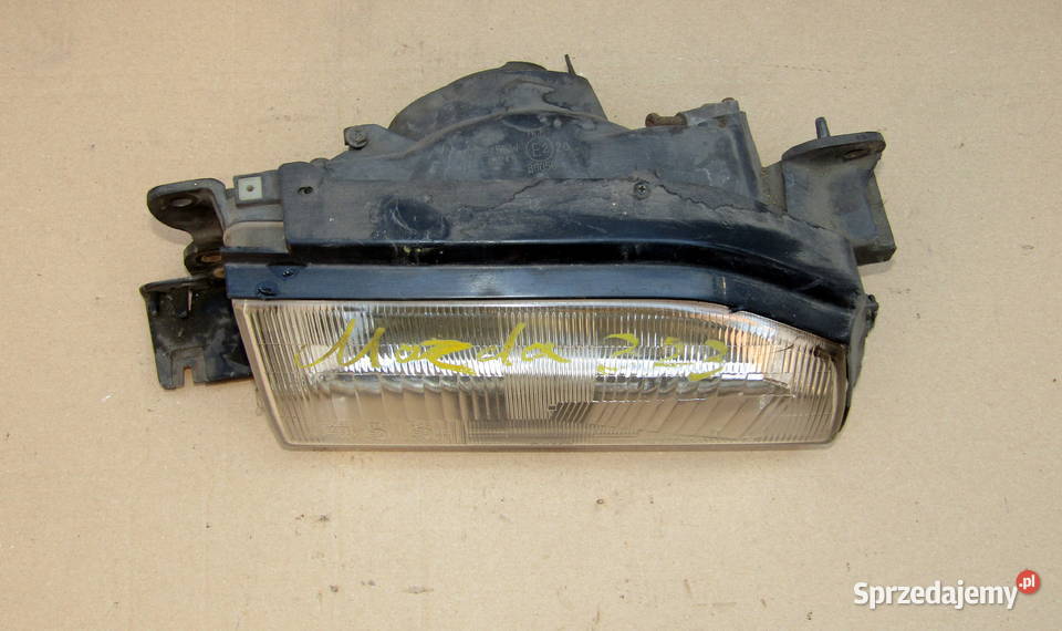 LAMPA PRZEDNIA PRAWA MAZDA 323 BF 8593 KOITO