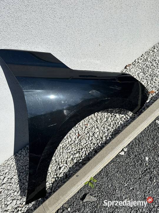 Opel Corsa F błotnik prawy przód przedni Mirsk