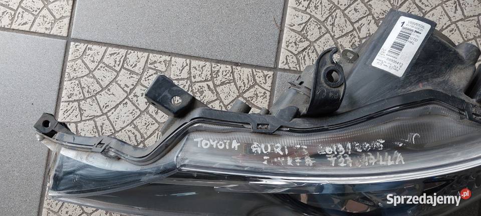 8115002e20 Toyota Auris lampa lewa 2013 2015 LED Byków