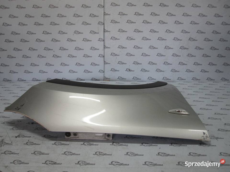 KIA SPORTAGE III 12r błotnik prawy przód osobowe