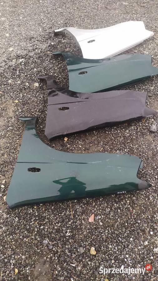 Mazda demio 2000 2001 2002 2003 błotnik lewy