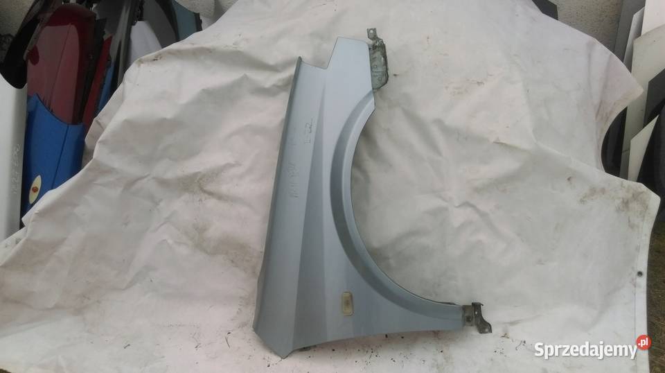 NISSAN PRIMERA P12 BŁOTNIK PRZÓD PRAWY B22 osobowe Błotniki