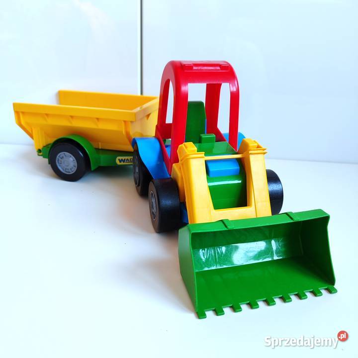 Nowy traktor ładowarka z przyczepą Wader
