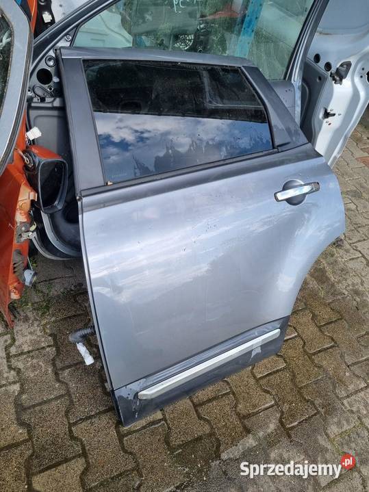 DRZWI LEWY TYŁ QASHQAI J10 LIFT 2 KY0G