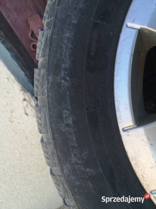 Felgi Ford Ronal 5x112 YM2JBA Plus Opony Zimowe Skomielna Biała