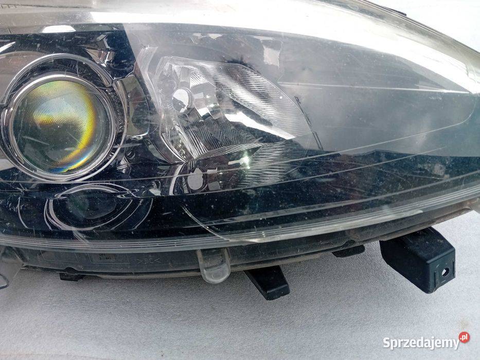 Renault Scenic III Lift reflektor lampa prawy Lampy przednie Przeźmierowo