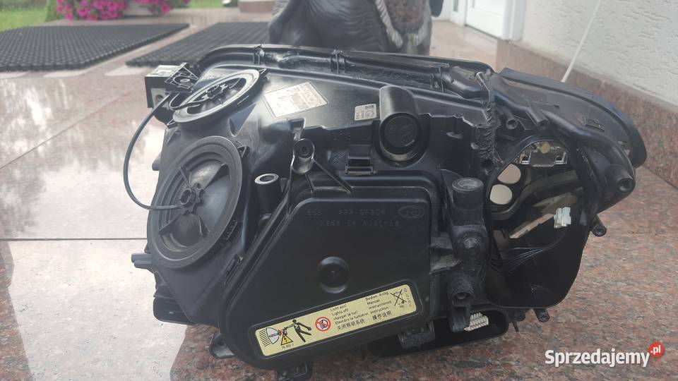 BMW F01 F02 lampa xenon 7182150 osobowe Oświetlenie Koleczkowo