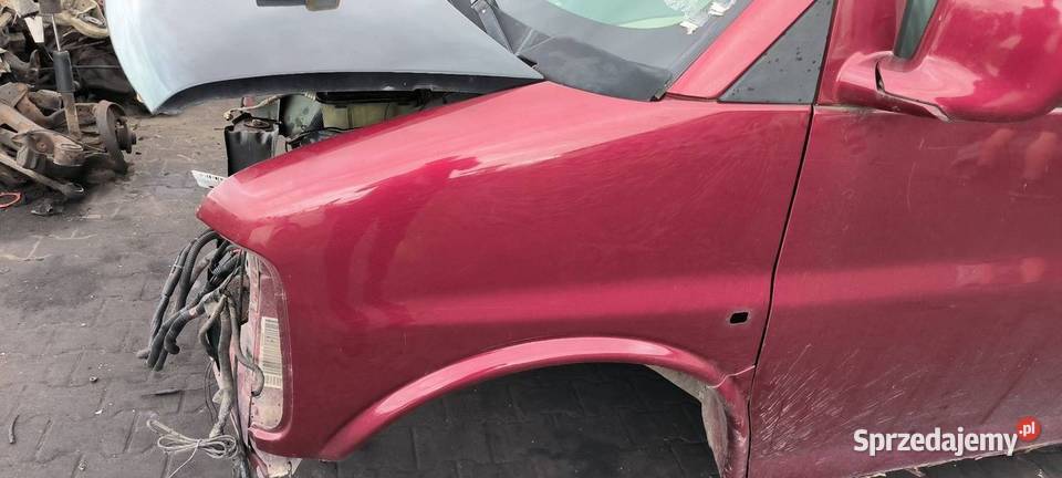 BŁOTNIK LEWY PRZÓD GMC SAVANA osobowe Lipno