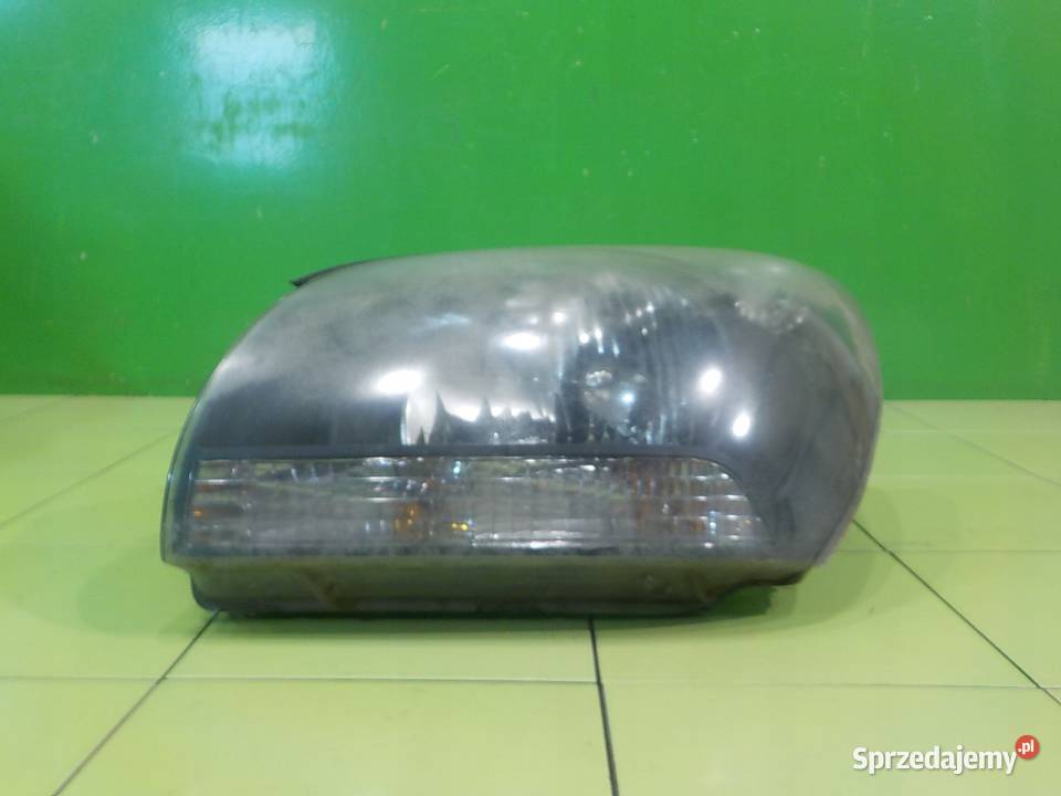 KIA SPORTAGE II 20 CRDI 07r 5D lampa lewa przod Suków