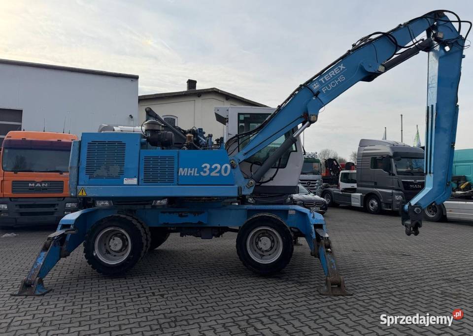 Koparka kolowa FUCHS 320 TEZ LRASING MASXYNY Warszawa