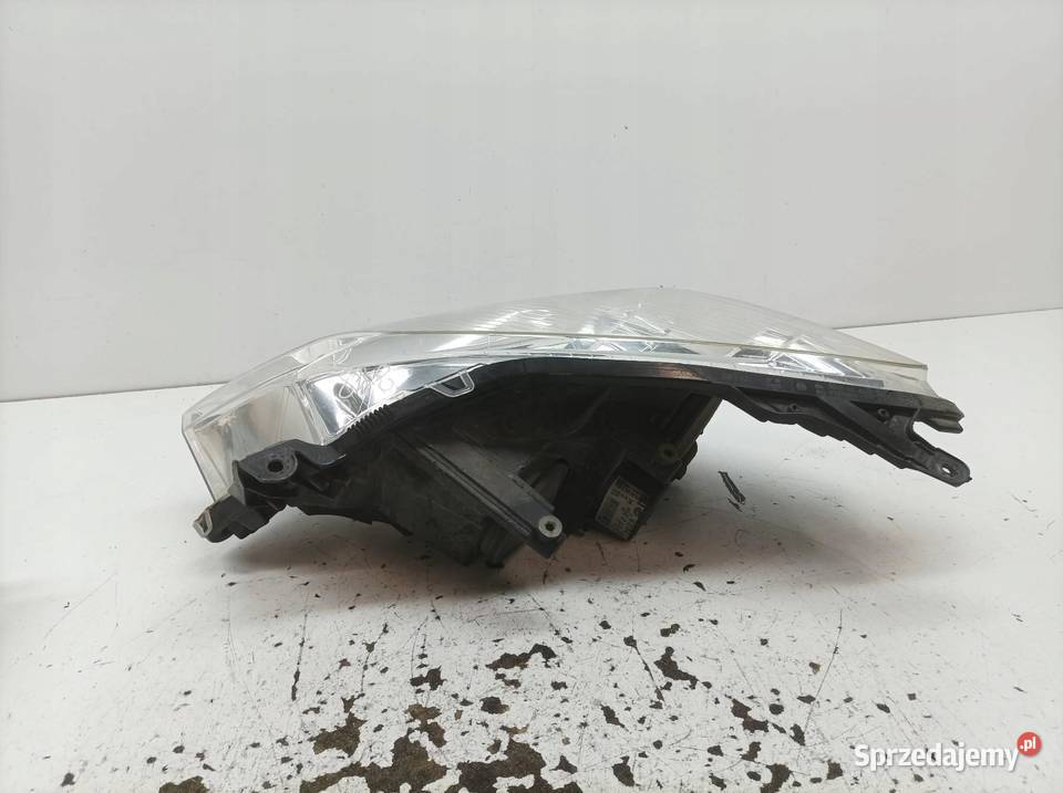 LAMPA PRZÓD 13239289 1EG27037042 Opel Astra III osobowe