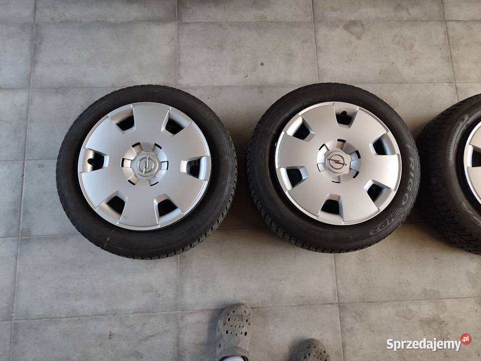 Felgi stalowe Opel 4 kołpaki oryginalne opony 3 Kraków