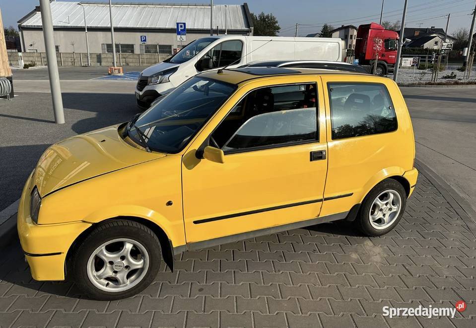 Felgi Fiat Cinquecento z oponami śląskie sprzedam