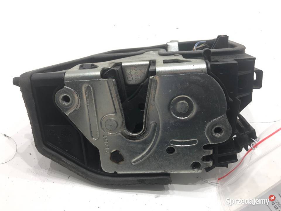 ZAMEK DRZWI LEWY TYŁ BMW E83 SUV 7202147 0311