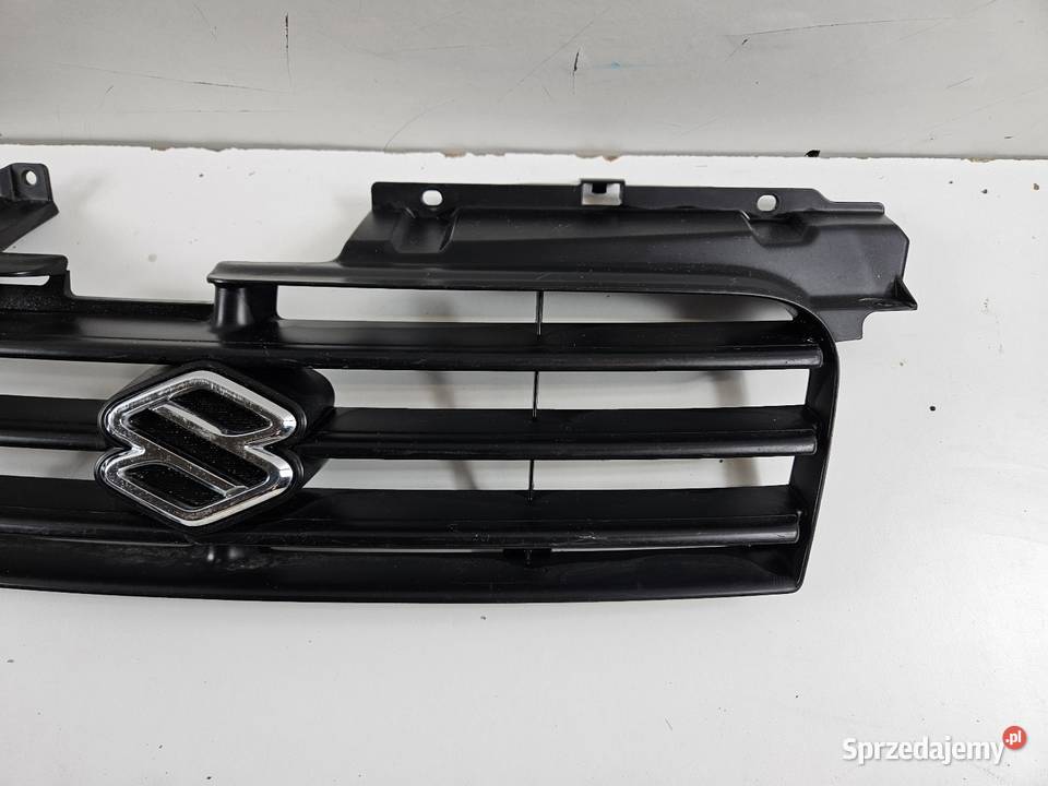 SUZUKI IGNIS I 0006 GRILL ATRAPA ZDERZAKA PRZÓD osobowe Atrapy Międzychód