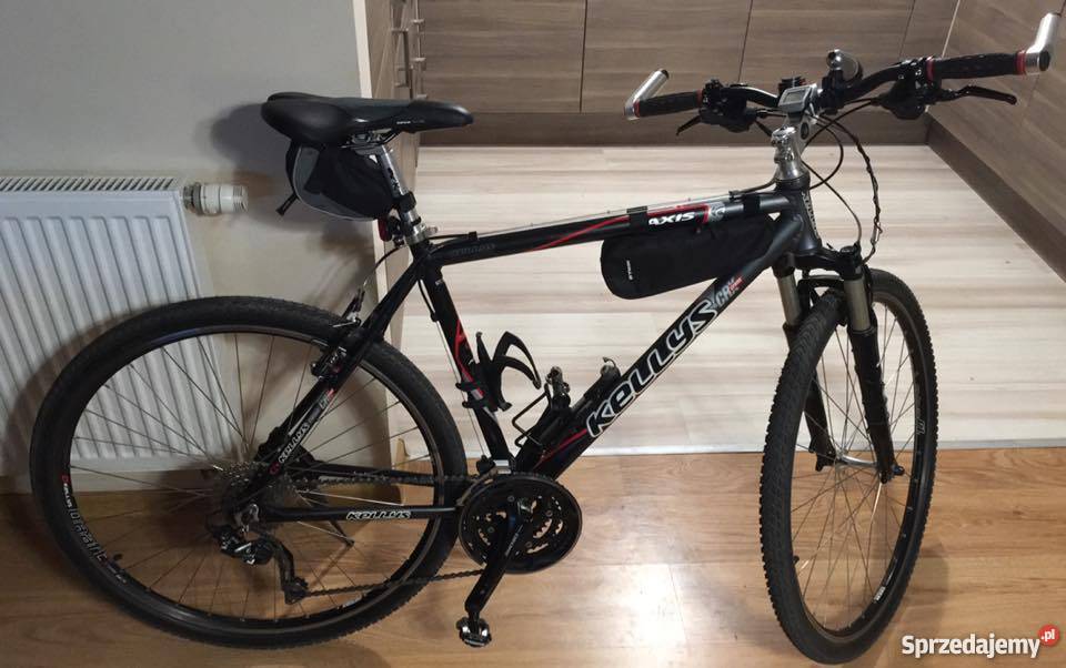Kellys Axis Grey pełne Deore RST VogueAir Sady
