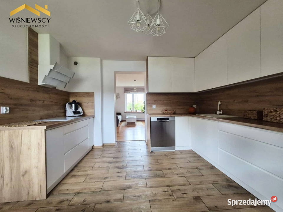 Dom z ogrodem i fotowoltaiką Goleszewo bliźniak