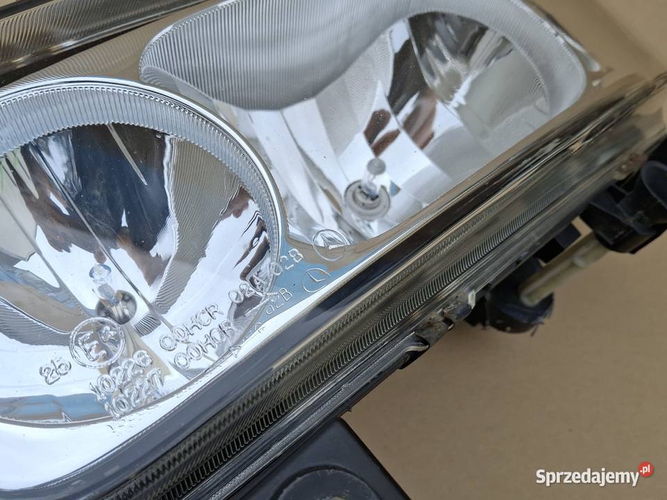 MERCEDES ATEGO REFLEKTOR LEWY ORYGINAŁ LAMPA Motoryzacja