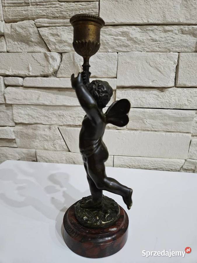 Świecznik brąz Francja XIX w Figurka Putto Kowal