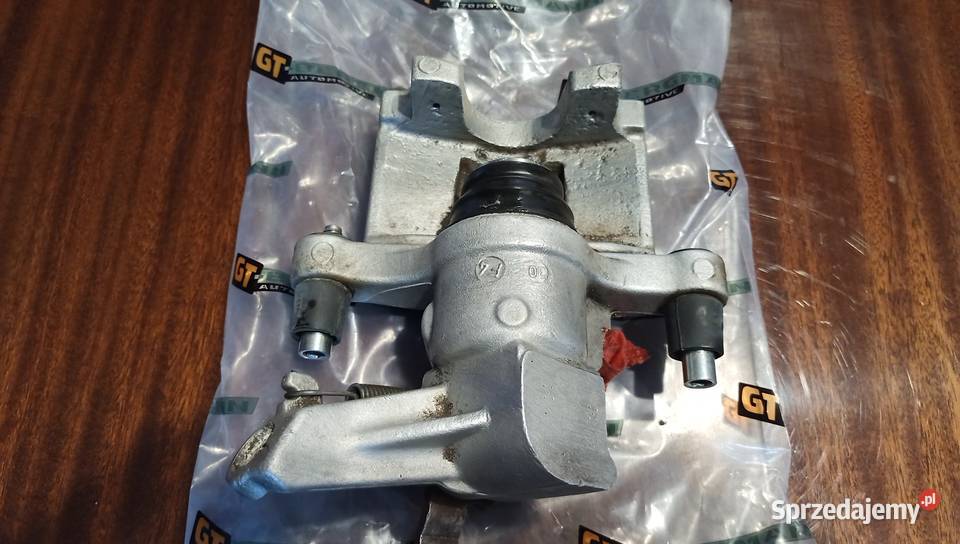 Oryginalny Zacisk GM hamulca LewyTył Opel Vectra