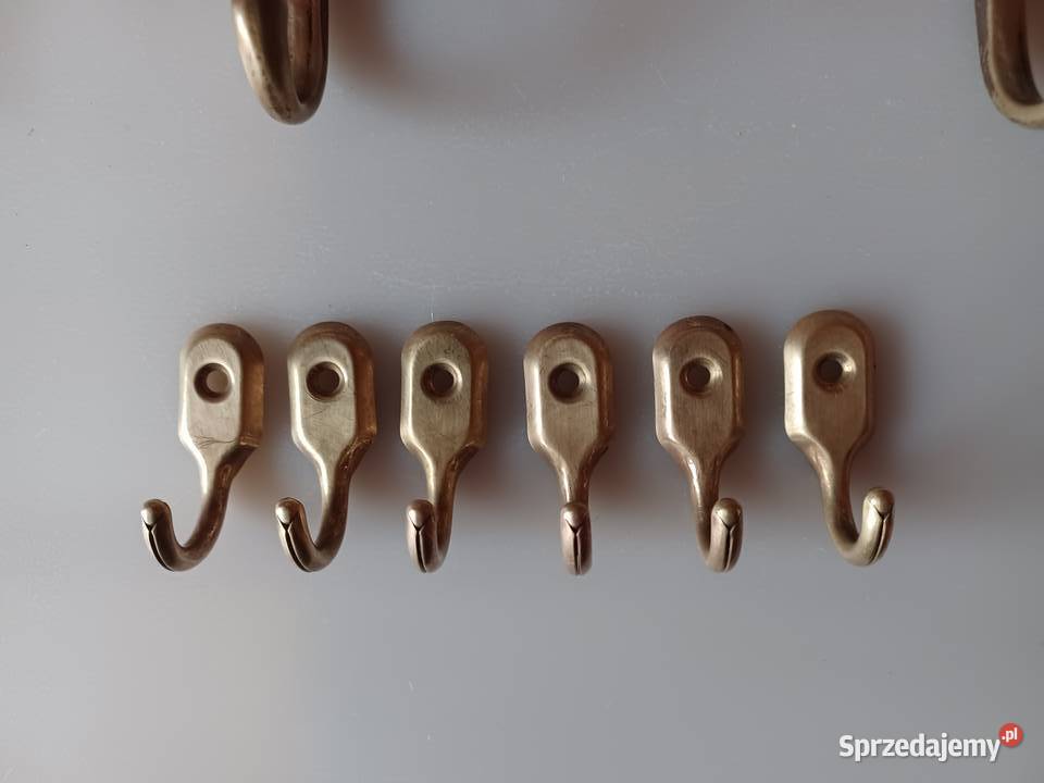 Komplet sześciu wieszaczków Mosiądz Poznań sprzedam
