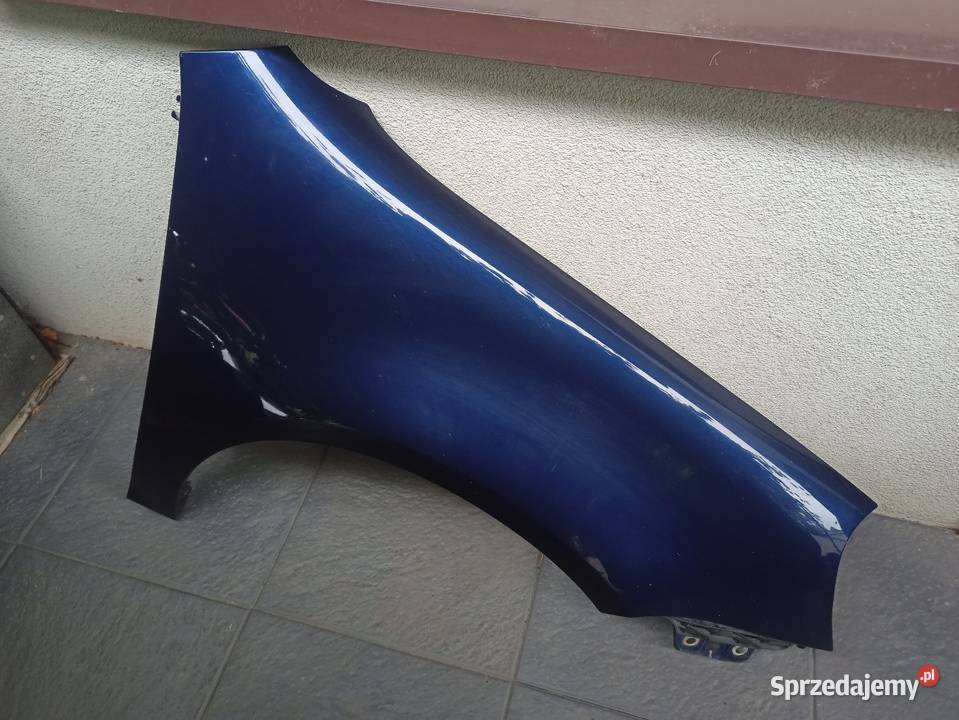 VW Golf V 5 błotnik przedni prawy granatowy LD5Q Sieradz